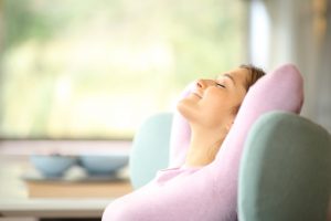 woman relaxing to fertility affirmations